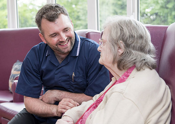 Our Approach - Adam Talking to a Care Home Resident