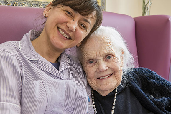 Broadland View Carer and Resident in the Lounge