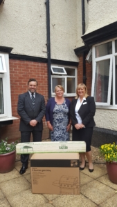 Sharon presented with our new BBQ and Gazebo by Co-op